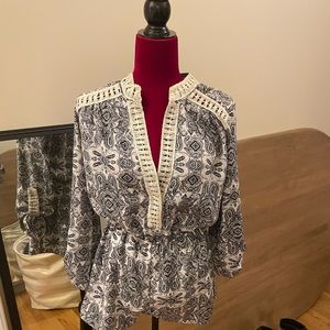 Romper. Long sleeve, light fabric.  Small.